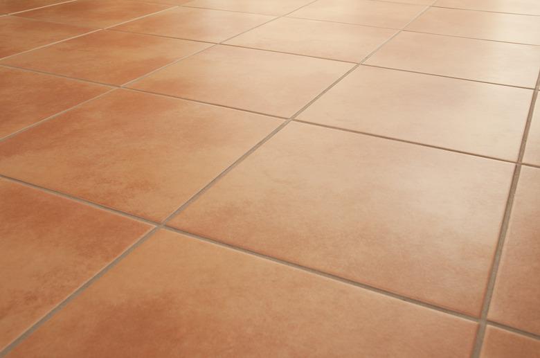 Terracotta floor tiles clean background diminishing perspective