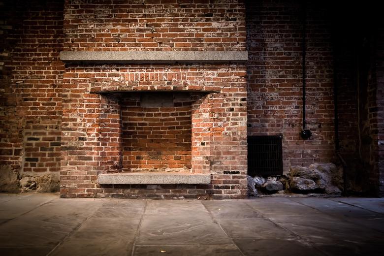 Brick wall and fireplace