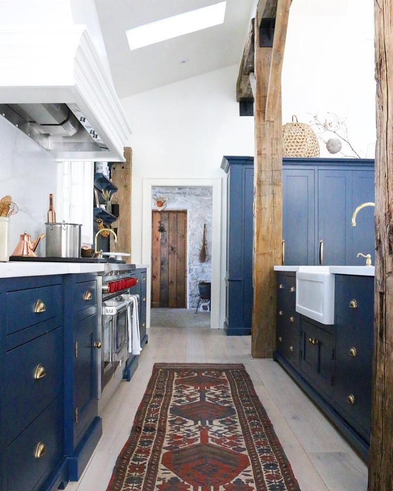 farmhouse kitchen with exposed wood beams