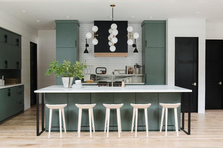 modern kitchen cabinet idea in the color green with large island