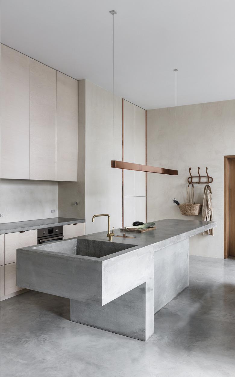 modern kitchen island made from concrete