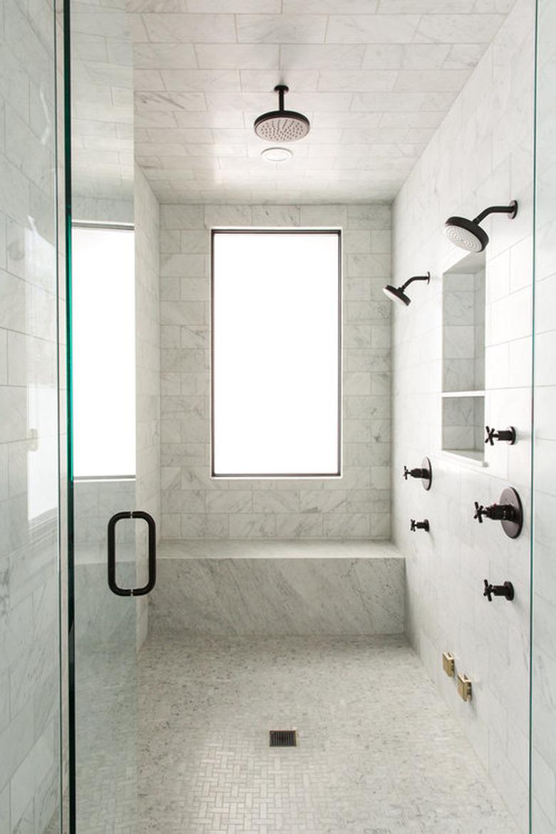 modern shower idea with marble shower with rainfall shower head and marble shower seat