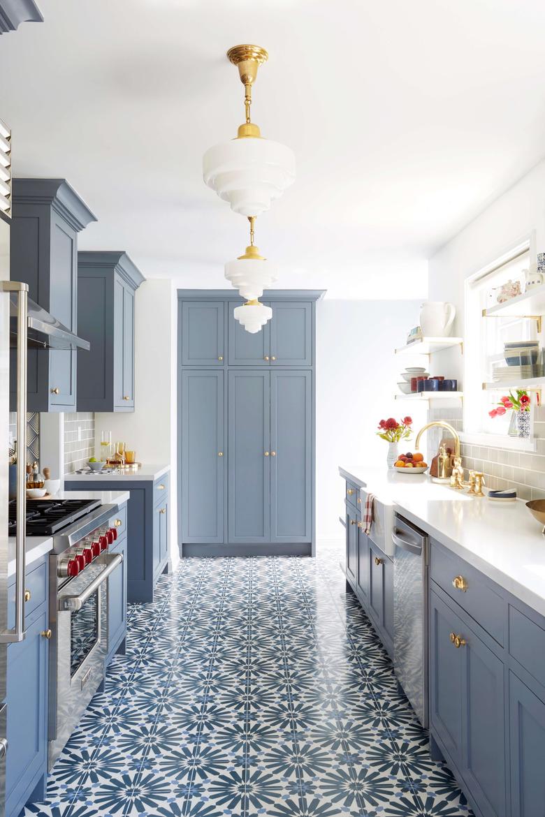 cornflower blue cabinets with Moroccan kitchen floor tiles