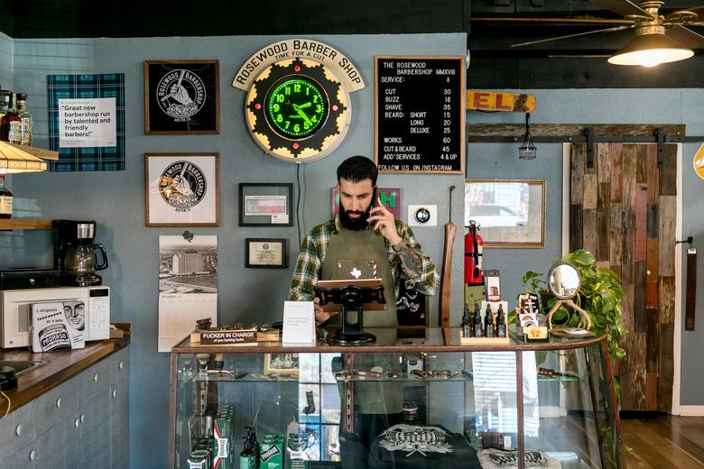 Derrick Crespo, co-owner of the Rosewood Barbershop