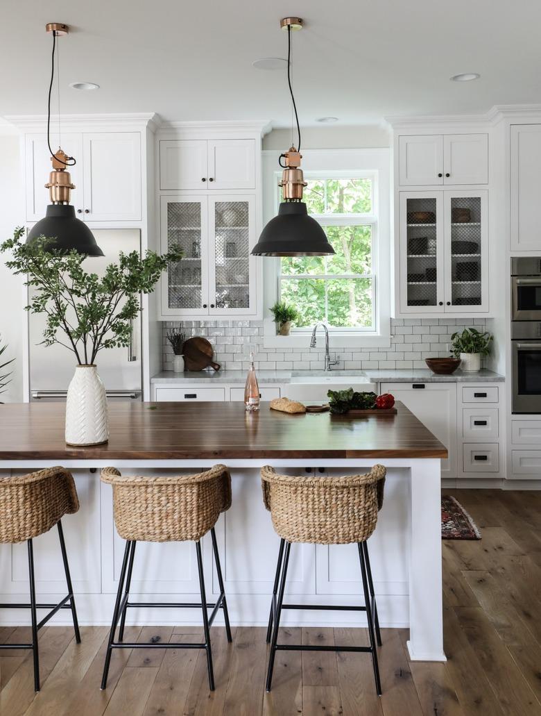 white one wall kitchen with butcher block island