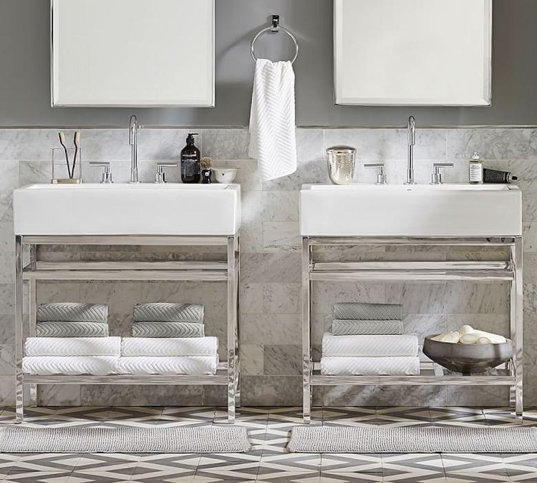 bathroom space with two rectangular mirrors and two vanities