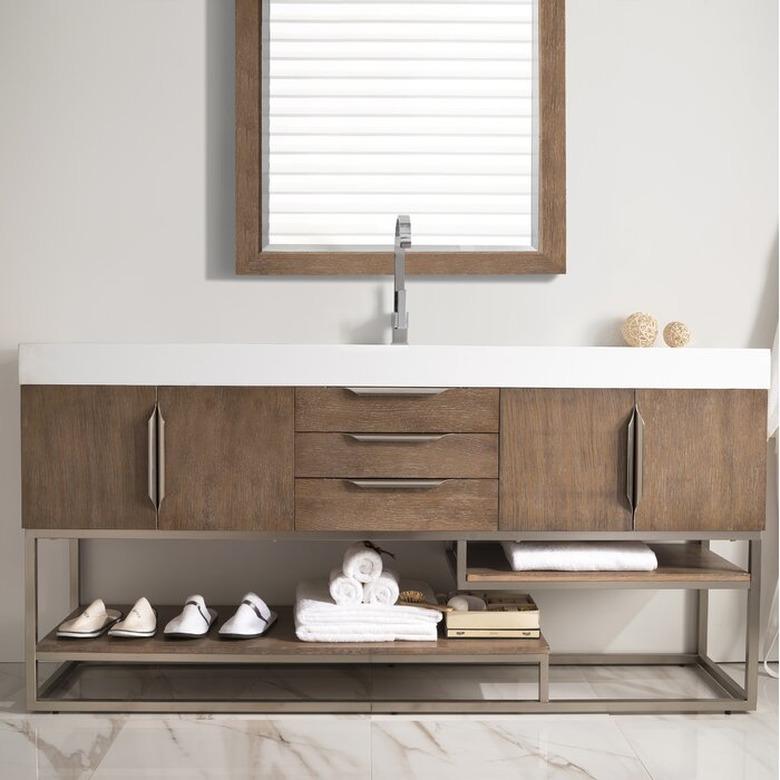 wood bathroom vanity with rectangular mirror above