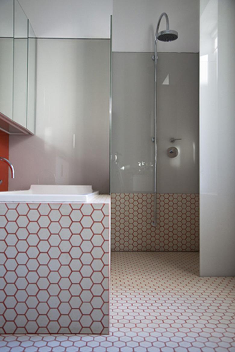 pink grout wet room with open shower