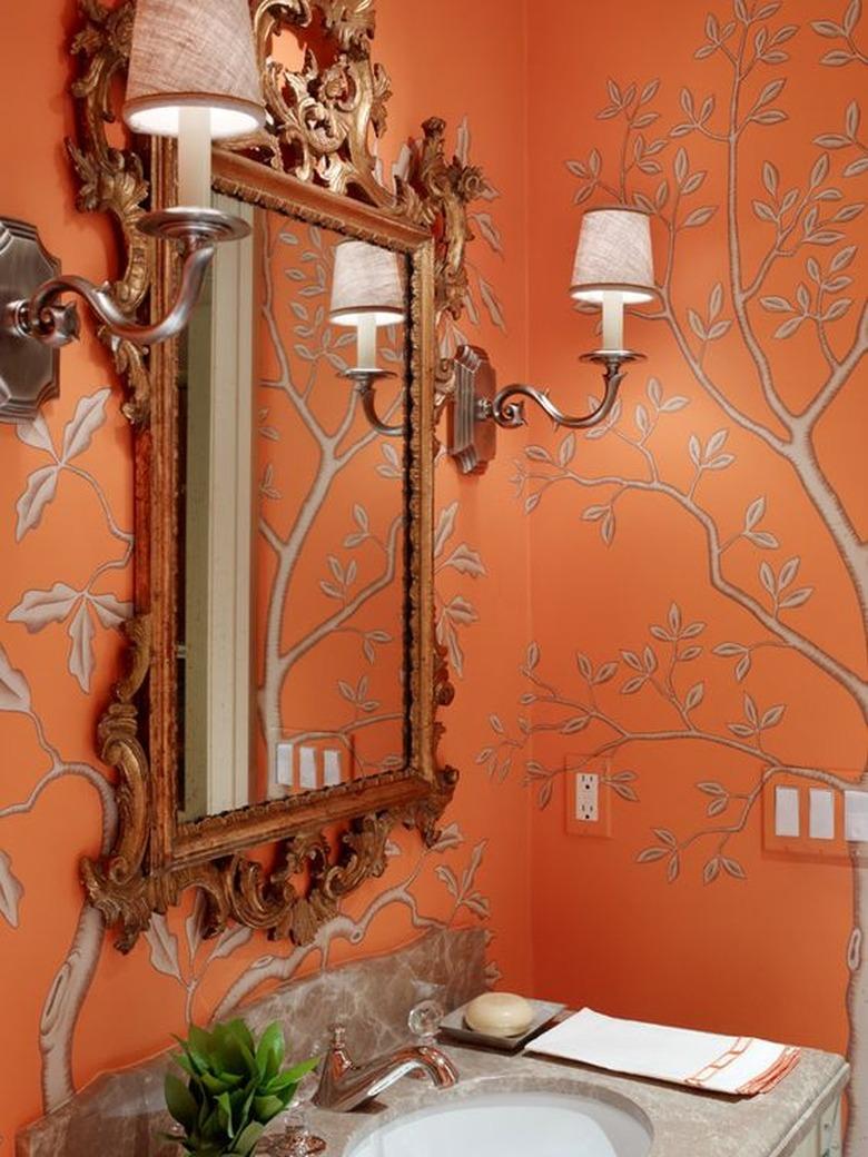 orange wallpaper in bathroom