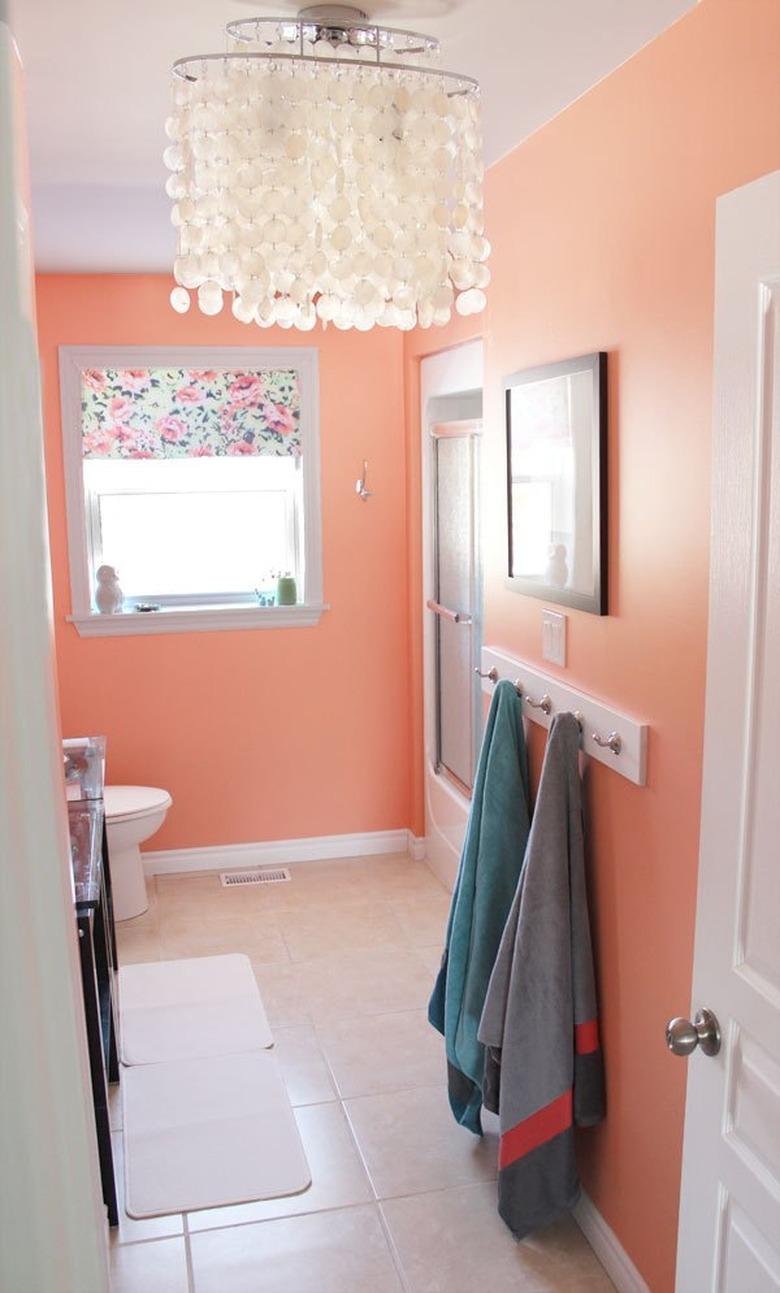 bathroom with peach orange paint