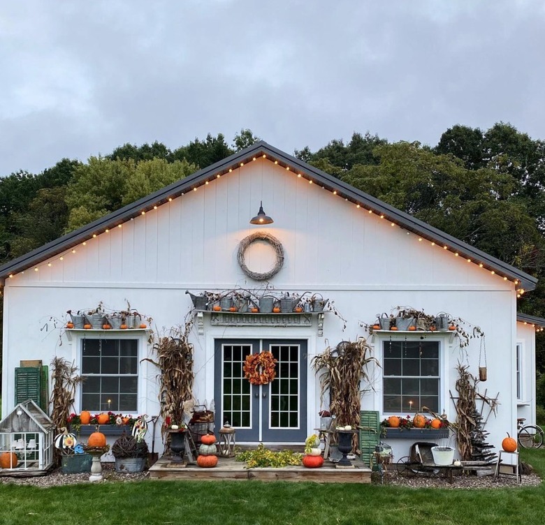 home outlined with orange twinkly lights.