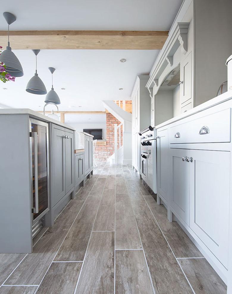 kitchen space with gray floor and gray cabinets