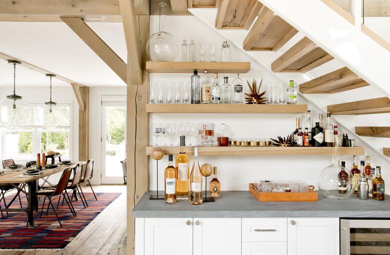 white and wooden rustic bar ideas under stairs