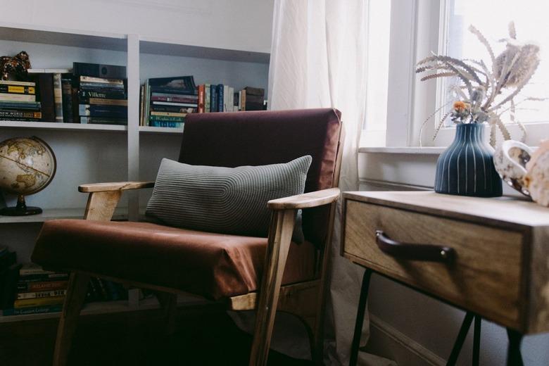 rustic decor with modern chair in corner with rustic modern wood side table