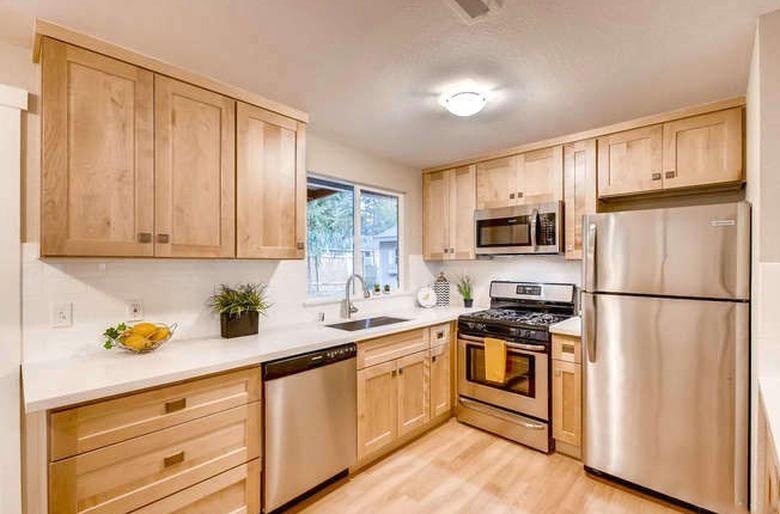 kitchen with natural maple shaker cabinets