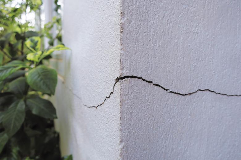 Cracked concrete building wall corner