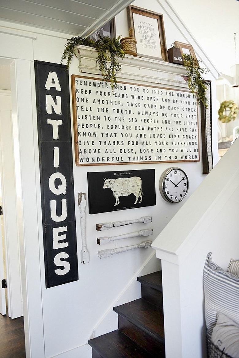 Farmhouse gallery wall along stairs