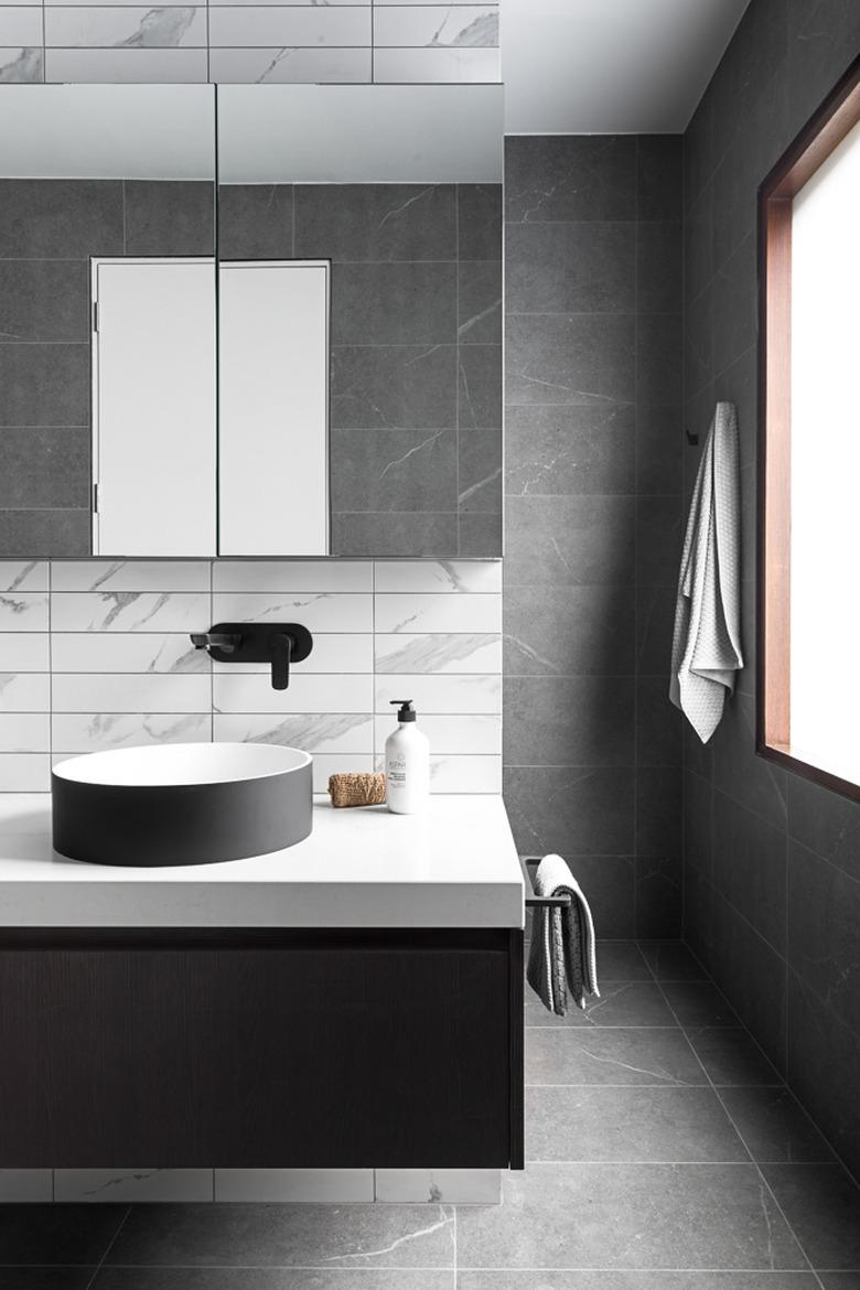 monochrome stone tile bathroom