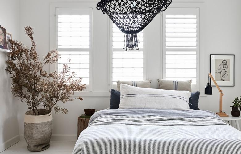 natural tones and elements in this white bedroom