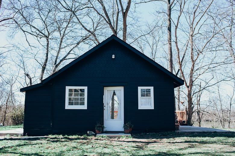 house with navy blue paint and white trim