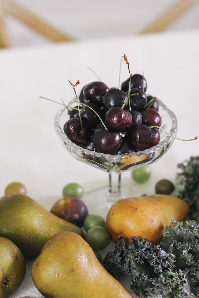 Bowl of long stem cherries