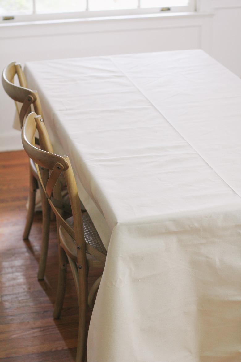 Canvas drop cloth draped over table