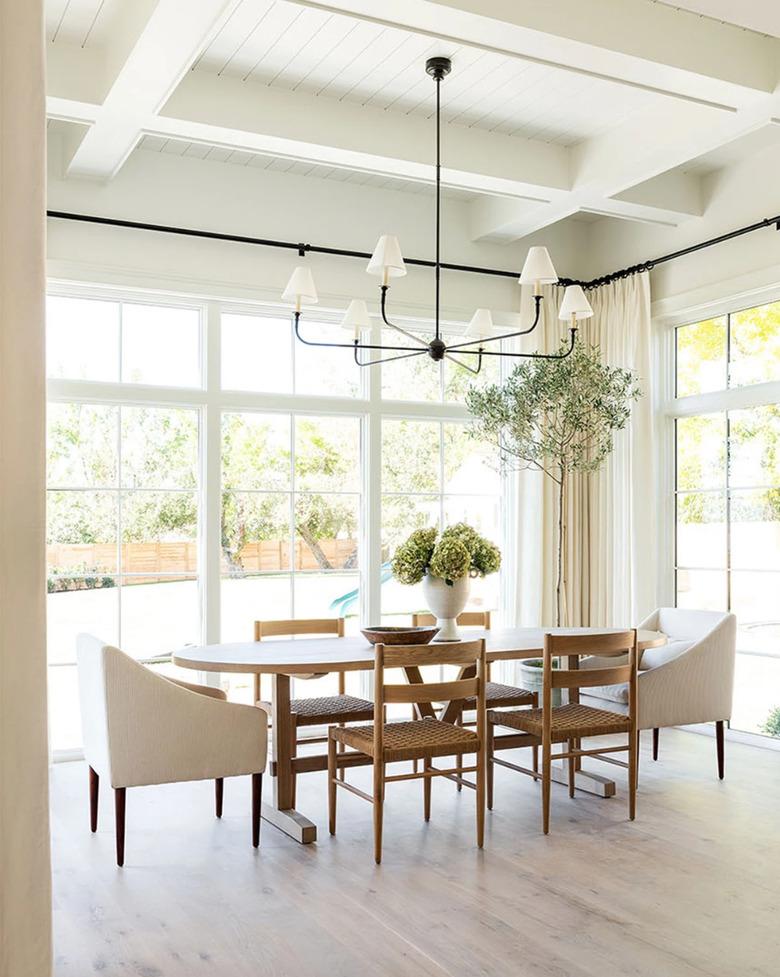 traditional dining room with long table and chairs