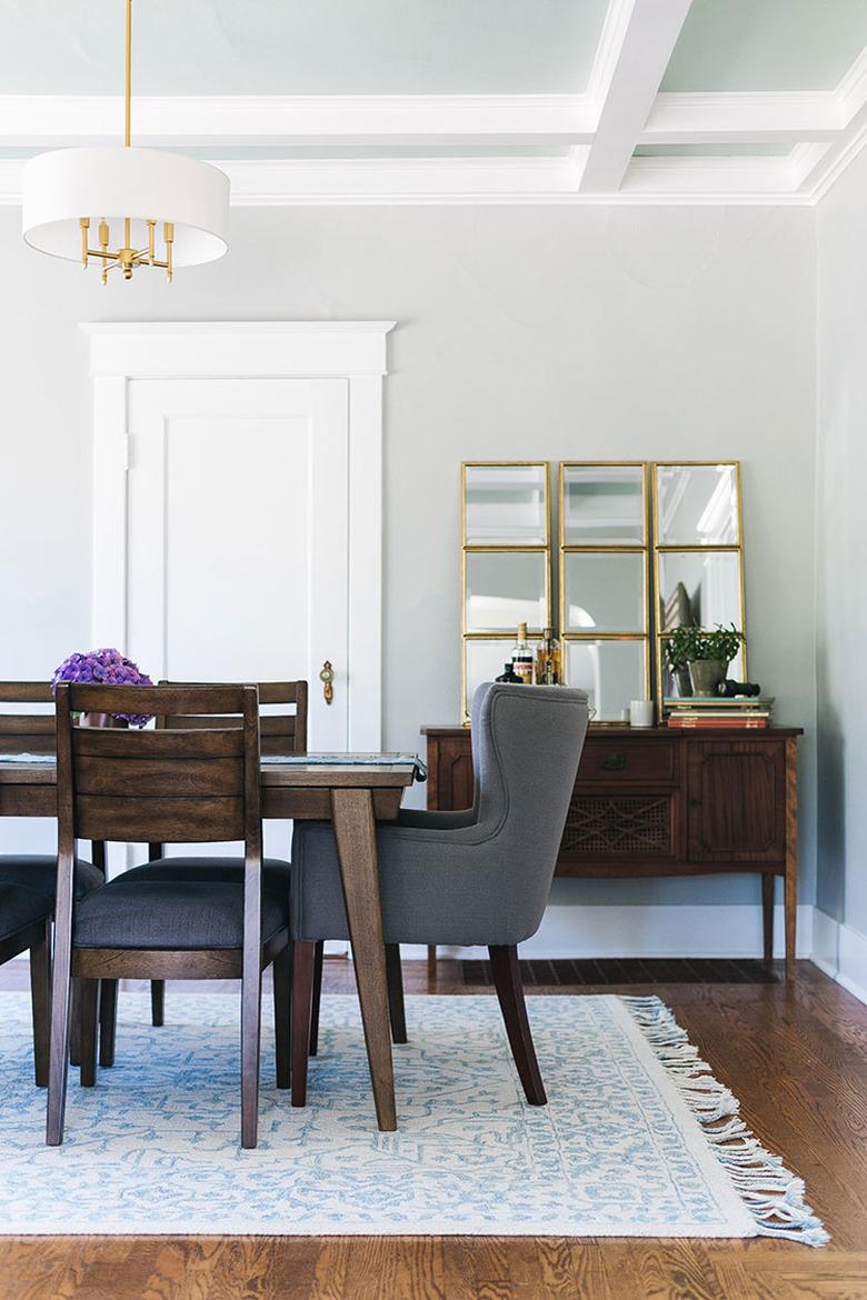 Craftsman dining room with brass and white traditional dining room lighting