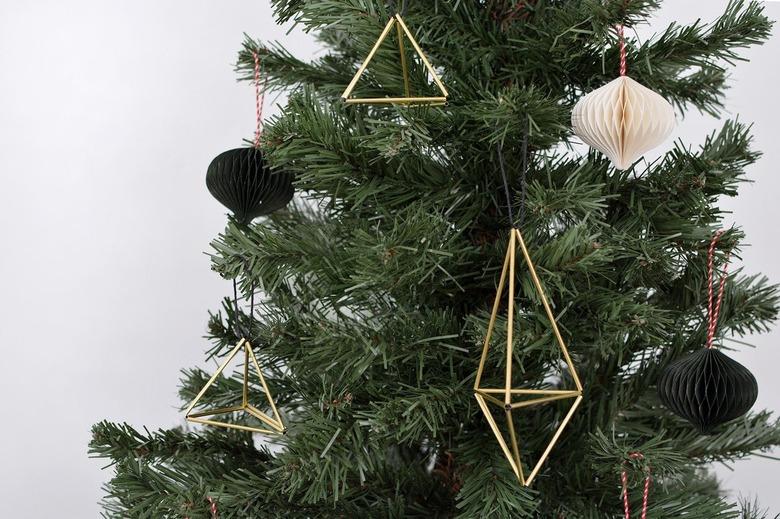 Tree with geometric gold twig ornaments and paper ornaments