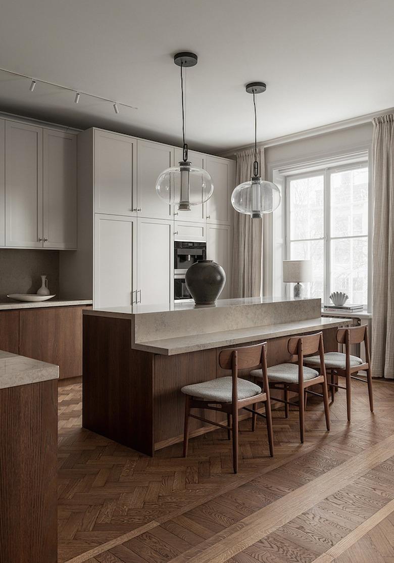 minimalist kitchen with two-tier kitchen island