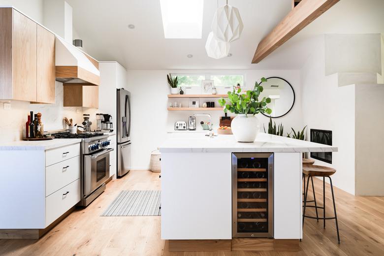 two-tone kitchen cabinets with light wood and white