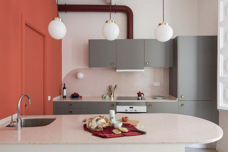 two-tone kitchen color idea with coral and gray kitchen