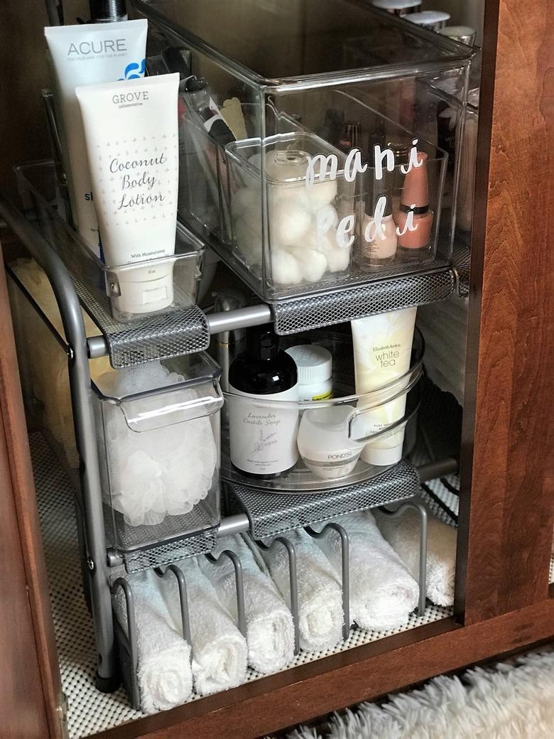 expandable shelving under bathroom sink storage