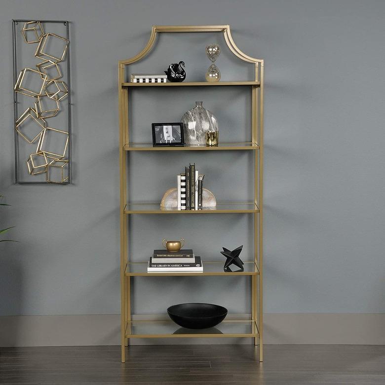 brass sleek bookshelf with black accents