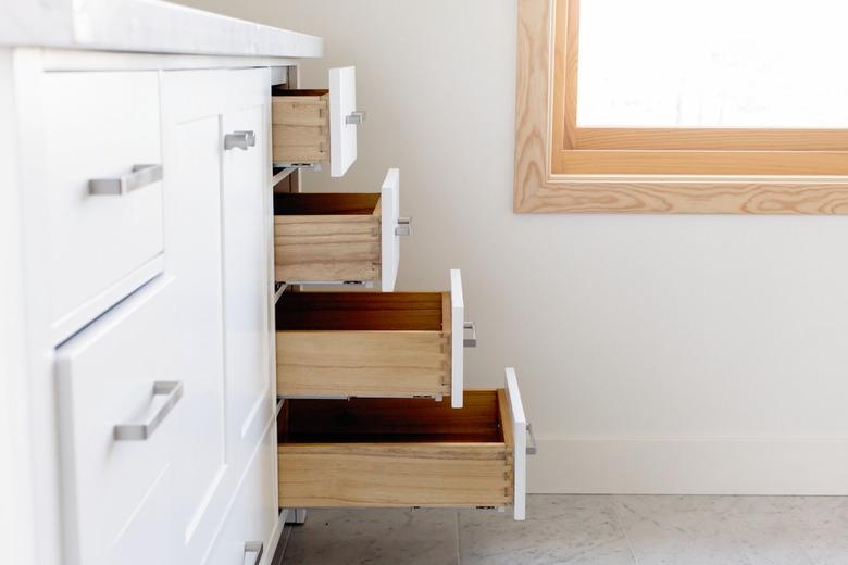 bathroom storage drawers, slightly open