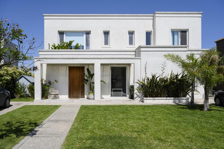 Modern two-story home and front yard in Buenos Aires