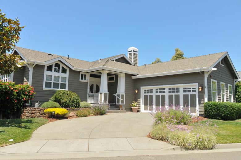 Two story single family house with driveway