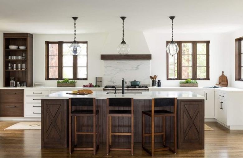 white kitchen with espresso kitchen island