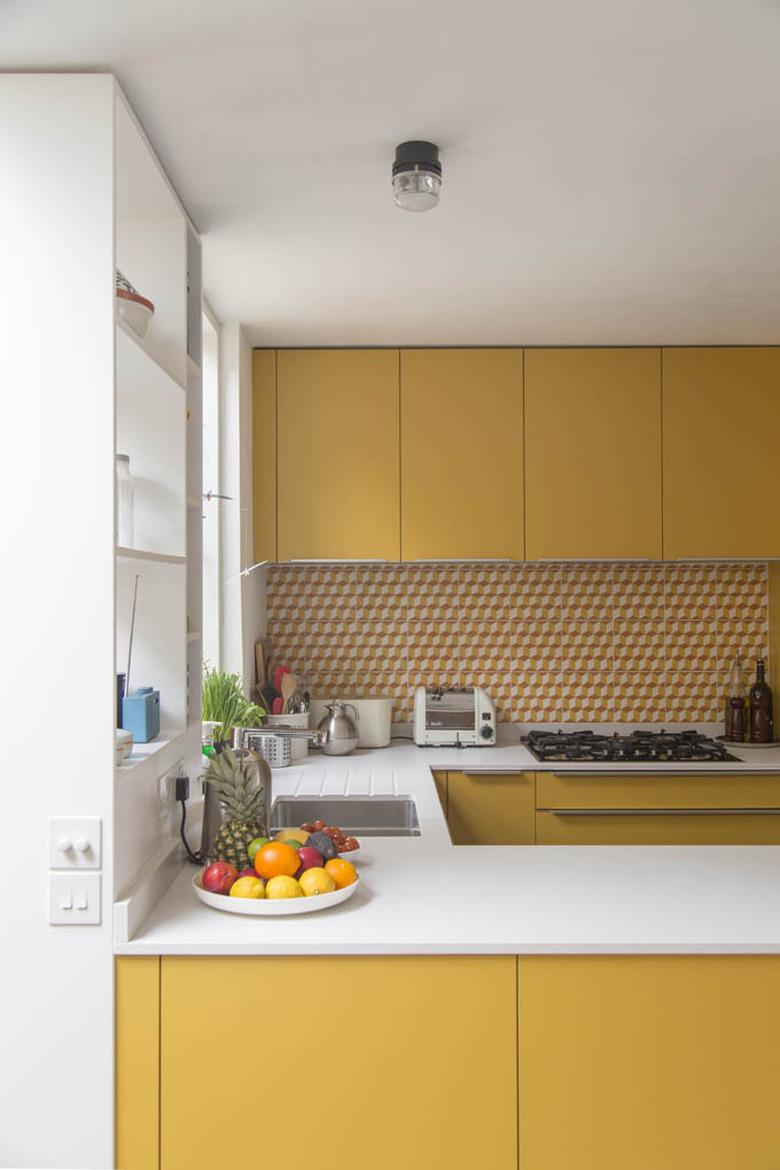 Yellow kitchen color idea with yellow backsplash tile