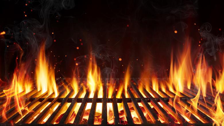 Fire coming up through grill grates