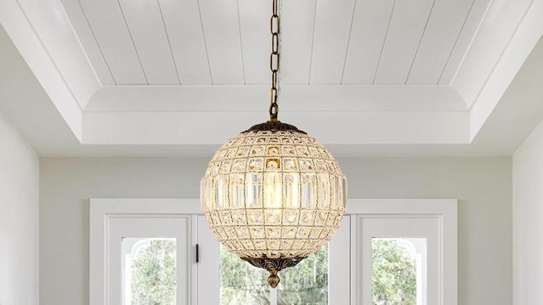 crystal globe chandelier in entry