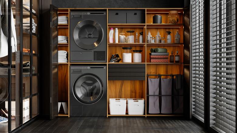 Stackable washer and dryer in free-standing shelving unit