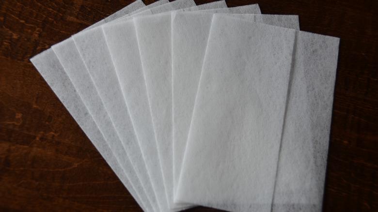 Stack of dryer sheets on table