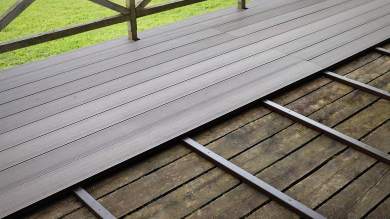 Composite decking installed over wood