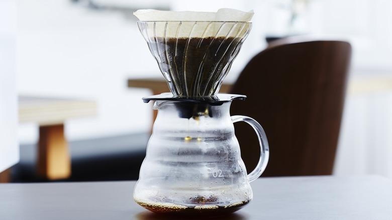 a percolator coffee dripping inside