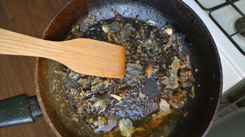 burnt greasy frying pan