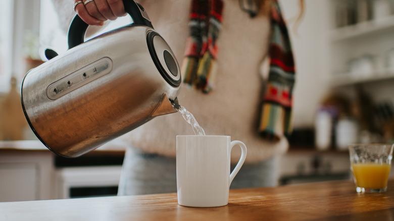 pouring water from a tea pot