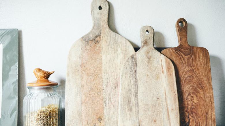 Close-up of three wooden cutting boards