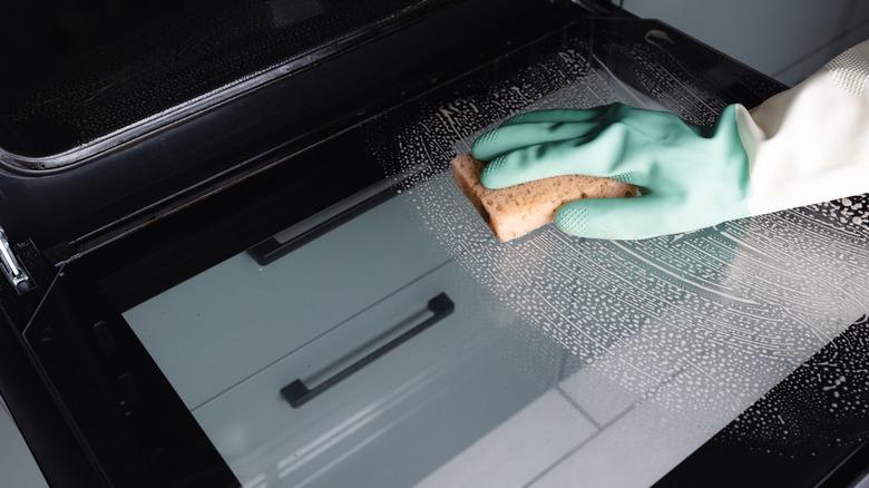Wiping down a very clean oven door