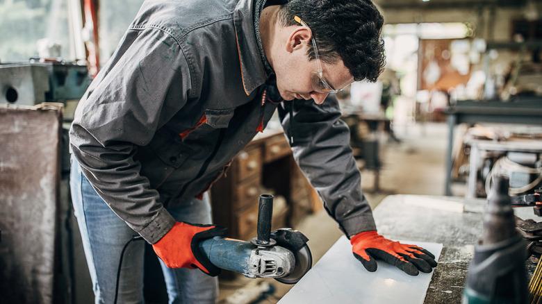 person working plexiglass